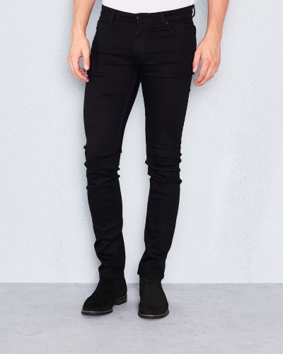 Till herr från Whyred, en svart blandade jeans.