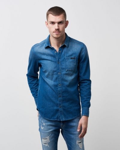 Till herr från Calvin Klein Jeans, en jeansskjorta.