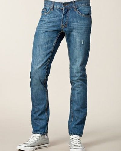 Blå slim fit jeans från Cheap Monday till herr.