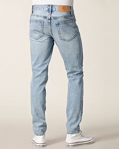 High Slim Light Trash Cheap Monday slim fit jeans till herr.
