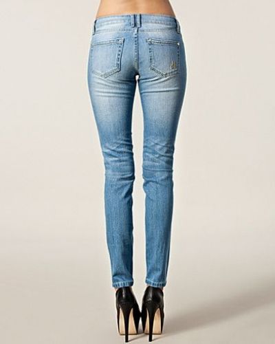 Blå slim fit jeans från d. Brand till dam.