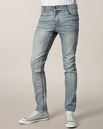 Till herr från Cheap Monday, en blå slim fit jeans.