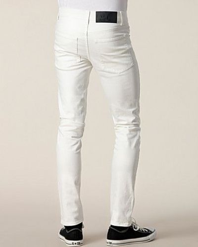 Till herr från Cheap Monday, en vit slim fit jeans.