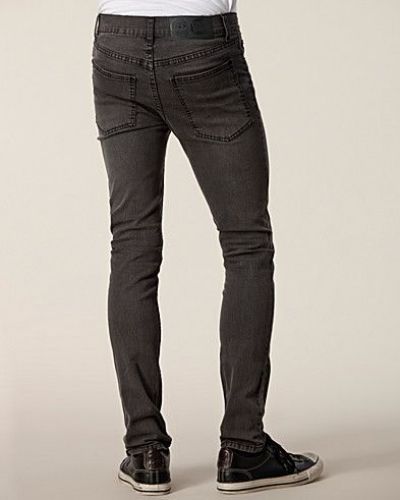 Till herr från Cheap Monday, en svart slim fit jeans.